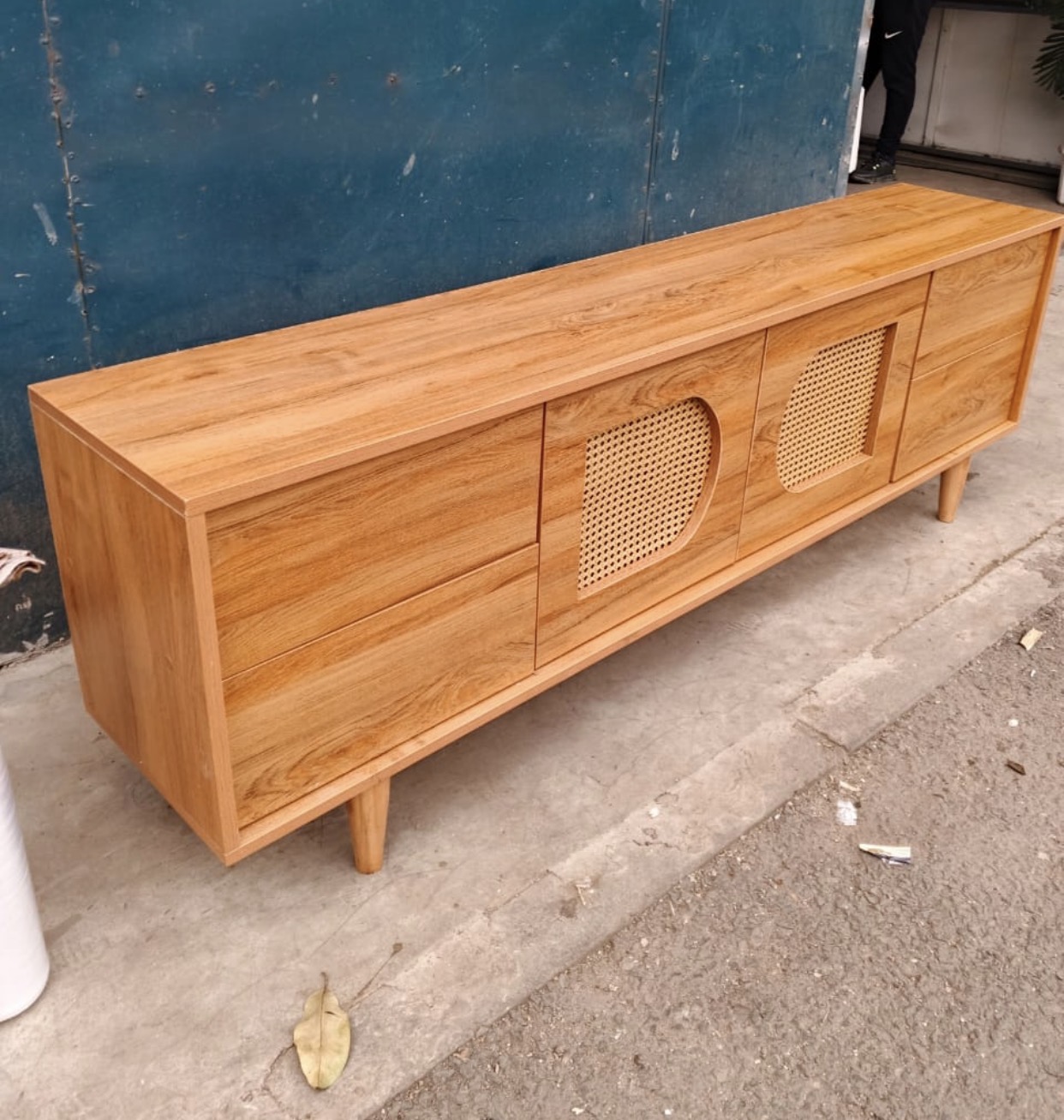 Readily available tv stand with ratan finish